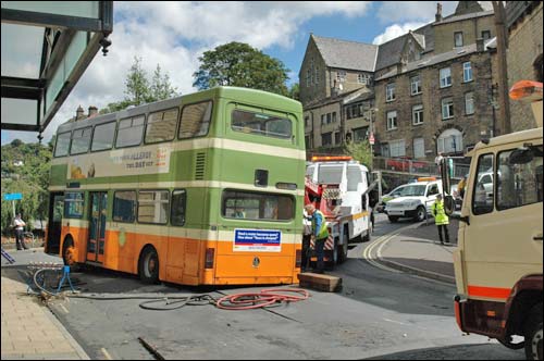 Hole under bus