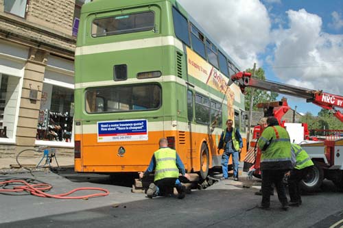 Hole under bus