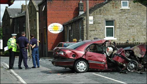 Lorry ploughs into house